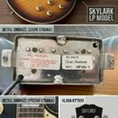Koláž čtyř fotografií elektrické kytary typu LP v žlutomódním sunburst provedení. Na hlavě kytary je bílý nápis SKYLARK. Zadní strana snímače obsahuj…