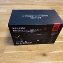 Černá kartonová krabice s nápisy NUX MIGHTY SPACE a Wireless Stereo Modeling Amplifier. Na povrchu je zobrazen produkt, černý kompaktní zesilovač s č…