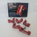 Na fotografii je pět červených triggerů značky ddrum a jejich originální krabice. Na krabici je nápis ACOUSTIC PROTRIGGERS by ddrum a obrázek trigger…