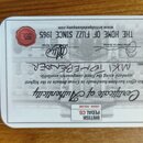 Fotografie zobrazuje Certifikát pravosti (Certificate of Authenticity) od společnosti BRITISH PEDAL CO. v Londýně, Anglii. Dokument obsahuje nápis TH…