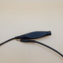 Černý audio kabel s konektorem jack 3,5 mm. Na plastovém krytu je vyraženo logo KRK. Povrch kabelu a konektoru je matně černý a bez viditelného opotř…