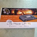 Krabice s produktem značky cymatic audio. Na obalu je nápis 16-track Audio / MIDI Live Player and 2-in/18-out USB Interface a název modelu Live Playe…