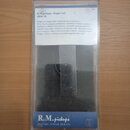 Průhledný plastový obal obsahuje černý snímač. V horní části je bílá nálepka s nápisem R.M.pickups Single Coil JRM 2N a doprovodným textem v češtině.…