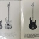 Fotografie dvou stran otevřeného katalogu nebo manuálu s popisy basových kytar. Na levé straně je nadpis PREBASS a fotografie dvou světle zelených ba…