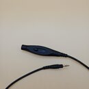 Černý kabel s konektorem jack a integrovaným posuvným přepínačem v plastovém krytu. Na krytu jsou u přepínače vidět nápisy MIN a MAX. Povrch plastu j…