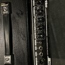Detail ovládacího panelu černého kytarového komba značky Hartke, model HD 50B. Panel obsahuje nápis HYDRIVE SPEAKER TECHNOLOGY a ovládací prvky: VOLU…