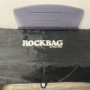 Černý textilní obal na nástroj s bílým nápisem ROCKBAG® by Warwick. Nad obalem je umístěn šedý plastový kryt, na kterém je vlisovaný nápis KURZWEIL.…