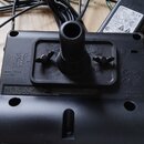 Černý plastový modul elektronických bubnů s nápisy Model: TD-4 a Serial No. (číslo nečitelné). Na zařízení je vidět logo Roland a doprovodný text v a…