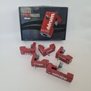 Krabice a pět červených triggerů značky ddrum. Na krabici jsou nápisy ACOUSTIC PROTRIGGERS, ddrum, SNARE TRIGGER a CONTAINS: 3x TOM, 1x SNARE, 1x KIC…