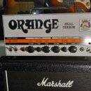 Bílá kytarová kombo hlava s nápisem ORANGE a označením DUAL TERROR. Přední panel obsahuje dva kanály, FAT CHANNEL a TINY TERROR CHANNEL, s ovládacími…