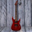 Červená elektrická kytara s výraznou strukturou dřeva na těle. Na hlavě je viditelné logo LIV a čtyři malé hvězdičky. Nástroj má dva humbuckery, jede…
