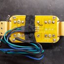 Žlutý elektronický modul s kovovými bočními uchopadly a pružinou. Na povrchu je nápis TH-VT B a sériové číslo 092438D. Modul je spojen s černými a mo…