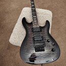 Černá elektrická kytara s výraznou strukturou dřeva na topu. Na hlavě hmatníku je viditelné logo PRS. Nástroj má dva humbuckery, prohýbatelný most a…