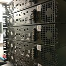 Fotografie zobrazuje čtyři černé rackové jednotky naskládané na sebe. Na přední straně každého zařízení je bílý nápis Cobrallet a označení PIP-USP/CN…