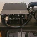 Černý audio rozhraní s nápisem steinberg a označením modelu UR 22C. Na přední straně jsou viditelné ovládací prvky, konektory D-PRE MaxLine a nápisy…