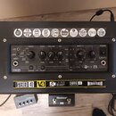 Černý kytarový kombo zesilovač s ovládacím panelem. Na přední straně jsou nápisy STEREO 40, ID:CORE V4 a Blackstar. Panel obsahuje několik otočných p…