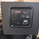 Zadní strana černého reproduktoru s textem Electro-Voice ELX200. Jsou zde vidět dva vstupy OUTPUT 1 a OUTPUT 2, ovládací prvky QuickScan/DSP/MONITOR…
