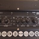 Černý kytarový kombo zesilovač s nápisem ID:CORE STEREO 10 V2. Na ovládacím panelu jsou knoflíky s popisky LEVEL, TYPE, MOD, EQ, VOLUME a GAIN, přepí…