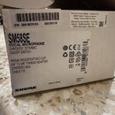 Krabice od mikrofonu s nápisem SM58SE VOCAL MICROPHONE, CARDIOID | DYNAMIC ON/OFF SWITCH. Na obalu je viditelné logo SHURE a text Made in China. Jsou…
