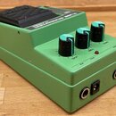 Zelený kytarový efekt v kovovém šasi s černým nášlapným spínáčem. Na horní části je nápis TUBE SCREAMER CLASSIC a logo Ibanez. Na přední straně jsou…