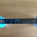 Černý rackový zvukový interface s nápisem MOTU 828mkII. Zařízení obsahuje řadu vstupů a výstupů, včetně konektorů MIDI, Optical A/B, FireWire, USB2 a…