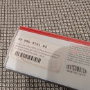 Fotografie zachicuje papírovou krabičku s ladicími mechaniky. Na bílé nálepce je uveden text GT PRL 8721 B0 a Graph Tech PRL-8721-B0 Ratio Electric L…