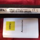 Černý textilní pouzdro s bílou nálepkou, na které je logo DPA MICROPHONES a text 4088-DL-A-F00-LH S/N K082510 CE 4088 Directional Headset, Beige, Mic…