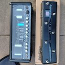 Dvě černé elektronické zařízení značky Hughes & Kettner. Levý přístroj má ovládací panel s několika otočnými knoflíky a přepínači, v horní části je r…