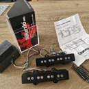Dvě černé humbuckery s viditelnými bílými póly a nápisem DiMarzio. K pickupům patří připojovací kabely v různých barvách a sada montážních šroubů. So…