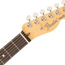 Detail hlavy a hředu elektrické kytary s tmavým hmatníkem. Na hlavě je černý nápis Fender TELECASTER a malý symbol kotvy. Povrch dřeva je světlý, v d…