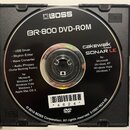 Fotografie zobrazuje DVD disk v plastovém obalu. Na disku je bílý nápis BOSS a BR-800 DVD-ROM, dále značka cakewalk by Roland SONAR LE. Jsou zde vyps…