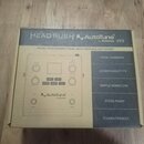 Kartonová krabice s produktem HeadRush AutoTune by Antares VX5. Na balení je nápis VOCAL PROCESSING PEDAL WITH ANTARES AUTOTUNE a seznam funkcí jako…