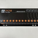 Černý napájecí adaptér pro pedály s nápisem Palmer PWT12 Power Bar. Zařízení obsahuje dvanáct očíslovaných výstupů a vstup označený jako Power Input…
