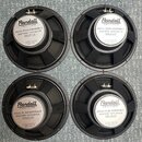 Čtyři černé kytarové reproduktory s bílými štítky. Na štítcích je uveden nápis Randall AMPLIFIERS, HIGH PERFORMANCE GUITAR SPEAKER a Model: RS12-50 8…