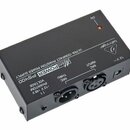 Černý obdélníkový zdroj napájení s nápisem Micro POWER PS400 a ULTRA-COMPACT PHANTOM POWER SUPPLY. Na horní straně je logo behringer, přepínač ON a č…