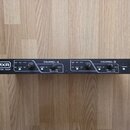 Černý rackový efekt s nápisy MXR CUSTOM SHOP a SMART GATE PRO. Zařízení obsahuje dva identické kanály označené jako CHANNEL-A a CHANNEL-B, každý s př…