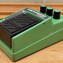 Zelený kytarový efekt s černým stoupákem. Na horní straně je bílý nápis TUBE SCREAMER CLASSIC a v malém políčku označení TS10. Na stoupáku je vyražen…