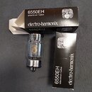 Na fotografii je elektronická lampu v originálním balení. Na lampě i na obou černých krabičkách je uveden nápis 6550EH electron tube a značka electro…