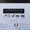 Fotografie zobrazuje přední stranu zvukové karty s nápisem TERRATEC DMX 6Fire USB. Zařízení je černé a obsahuje různé vstupy a výstupy, včetně konekt…