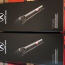 Dvě identické černé krabice s obrázkem mikrofonu. Na obalech je bílé logo a nápis AUSTRIAN AUDIO oraz model OD505 s popisem Active Dynamic Vocal Micr…
