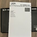 Fotografie zobrazuje uživatelskou příručku k efektovému procesoru s nápisem BOSS GUITAR EFFECTS PROCESSOR GT-1000CORE. Manuál je psaný v několika jaz…