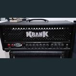 Černý kytarový kombozesilovač s nápisem KRANK AMPLIFICATION na přední mřížce. Na ovládacím panelu je modelové označení e.SST a přepínače pro KRANK CH…
