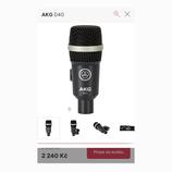 Černý dynamický mikrofon s kovovou síťkou a stříbrným prstencem. Na těle je bílé logo v kruhu a nápisy AKG D40. Mikrofon je zobrazen v několika úhlec…