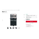 Černý kytarový efekt pedál značky Boss, model Metal Core ML-2. Na horní části jsou čtyři ovládací knoflíky s popisky LEVEL, LOW, HIGH a DIST a červen…