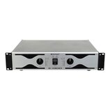 Stříbrný rackový zesilovač značky OMNITRONIC s modelem E-1300. Přední panel obsahuje dva ovratidla pro CH 1 a CH 2, vypínač POWER a dvě sady LED indi…