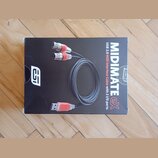Fotografie znázorňuje černou krabici s produktem. Na obalu je zobrazen USB-MIDI kabel a nápisy MIDIMATE eX, USB 2.0 MIDI Interface Cable with 2 I/O p…