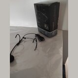 Na fotografii je černý headset s mikrofonem a doprovodná krabice. Na černé krabici je nápis Professional SoundSolutions a modelové označení C920L. Ka…