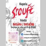 Fotografie zobrazuje reklamní leták s textem „Kapela SPOUŠTĚ hledá BASÁKA / BASAČKU (nejlépe ve věku od 20 do 35 let)“. V dolní části jsou uvedeny ko…