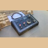 Černý audio rozhraní s nápisy SSL 2, USB AUDIO INTERFACE a 24-BIT / 192 kHz. Na horním panelu jsou ovládací prvky pro CHANNEL 1 a CHANNEL 2, dva červ…