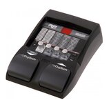 Černý kytarový procesor s nápisem MODELING GUITAR PROCESSOR a označením RP55. Zařízení obsahuje řadu posuvníků s popisky jako PICKUP, WAH, COMPRESSOR…